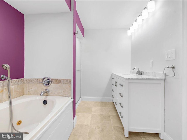 bathroom with tile patterned floors, independent shower and bath, and vanity