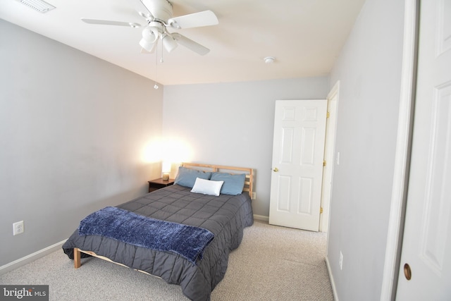 bedroom featuring visible vents, baseboards, and carpet floors