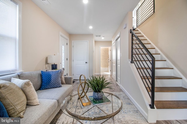 living room with light hardwood / wood-style flooring