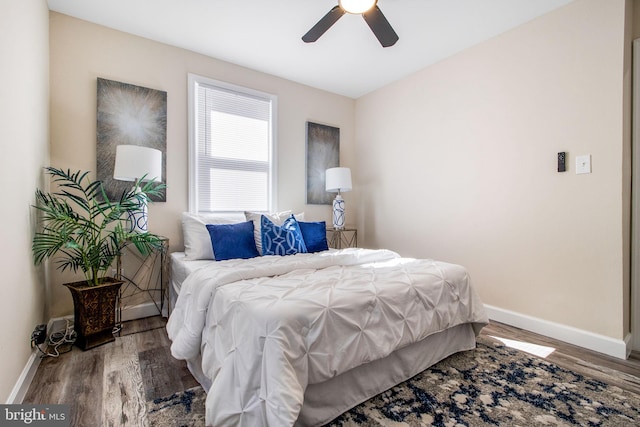 bedroom featuring ceiling fan and hardwood / wood-style floors