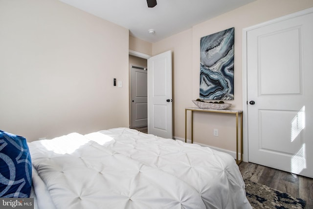 bedroom with ceiling fan and hardwood / wood-style floors