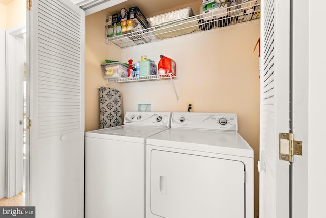 washroom with separate washer and dryer