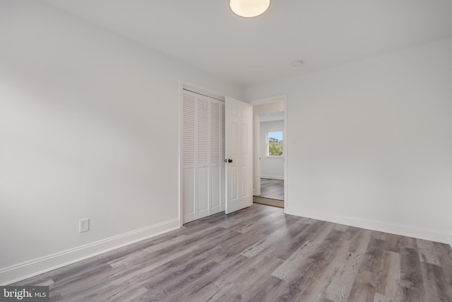 unfurnished room featuring light hardwood / wood-style floors