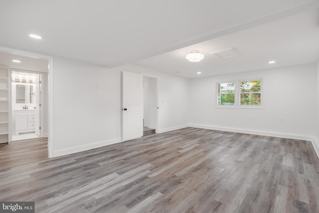 spare room with light hardwood / wood-style flooring