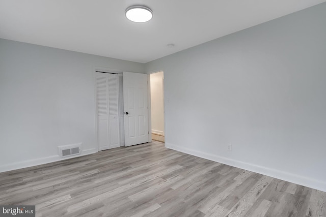 empty room featuring light hardwood / wood-style flooring