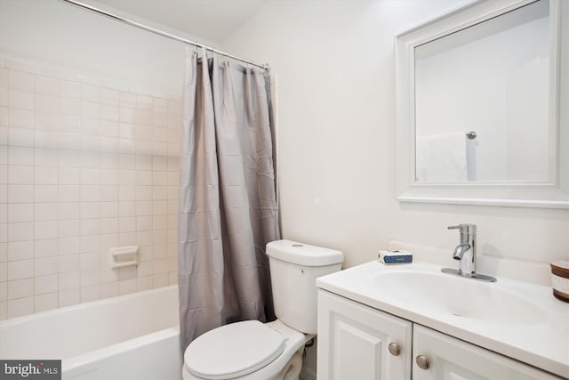 full bathroom with vanity, toilet, and shower / bath combination with curtain