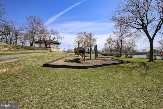 view of play area with a yard