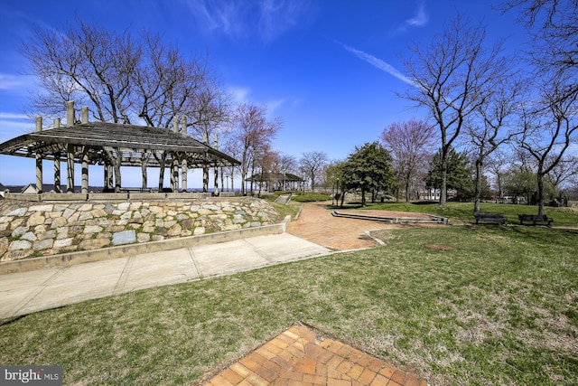 exterior space with a yard and a gazebo