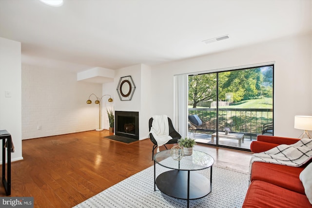 living room with hardwood / wood-style flooring