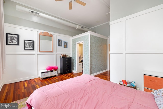 bedroom with dark wood-type flooring and ceiling fan