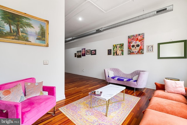 living room featuring dark wood-type flooring