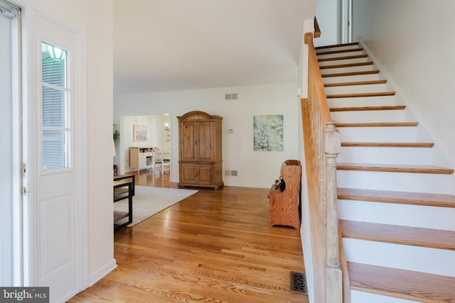 foyer with light wood-type flooring