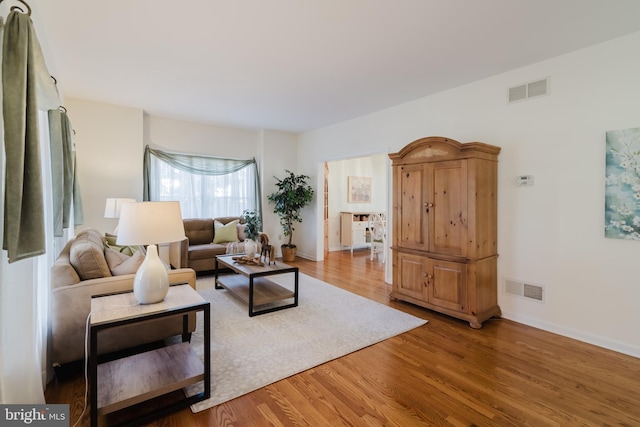 living room with hardwood / wood-style floors