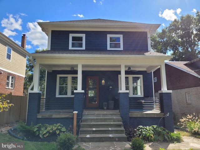 view of front of property with covered porch and ceiling fan