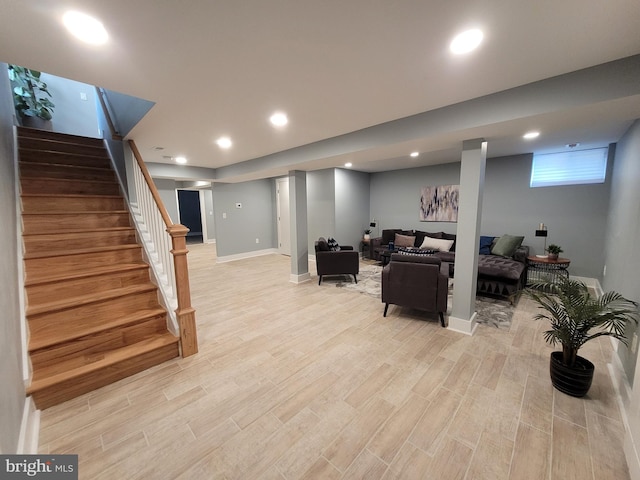 living room with light hardwood / wood-style floors