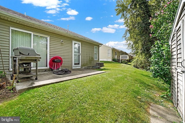 view of yard with a patio area