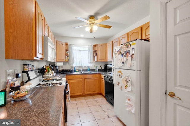 kitchen featuring white appliances, light tile patterned floors, sink, and ceiling fan