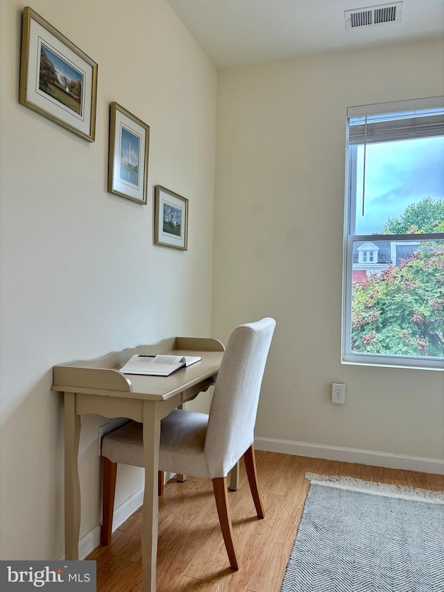 dining room featuring light hardwood / wood-style floors