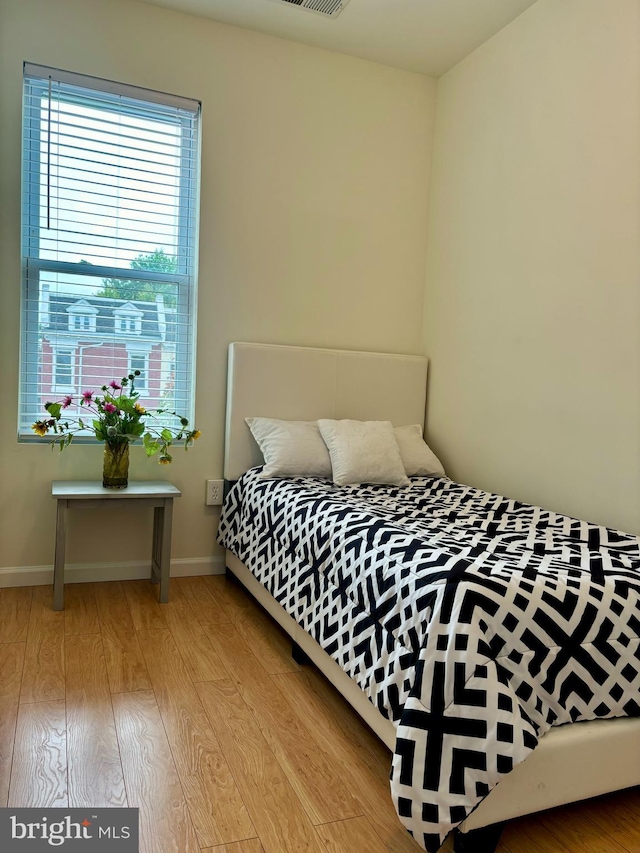 bedroom featuring light hardwood / wood-style floors