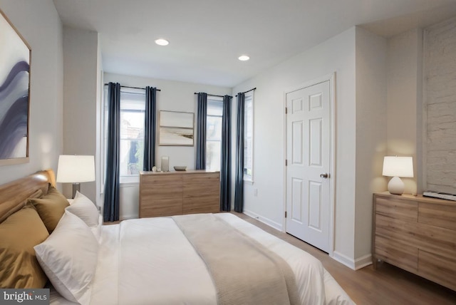 bedroom featuring hardwood / wood-style flooring