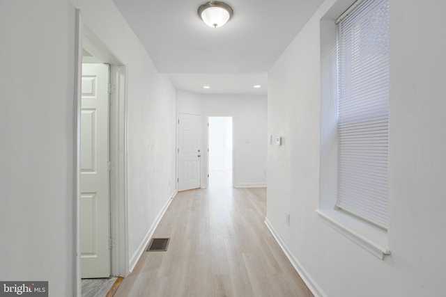 corridor featuring light wood-type flooring