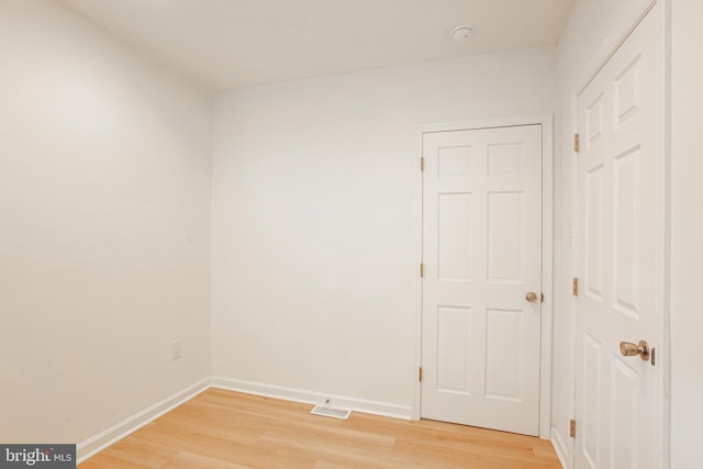 empty room with light wood-type flooring