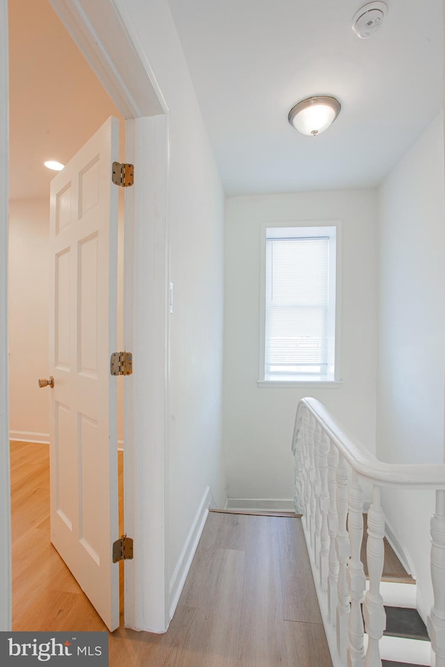 hallway featuring light hardwood / wood-style floors