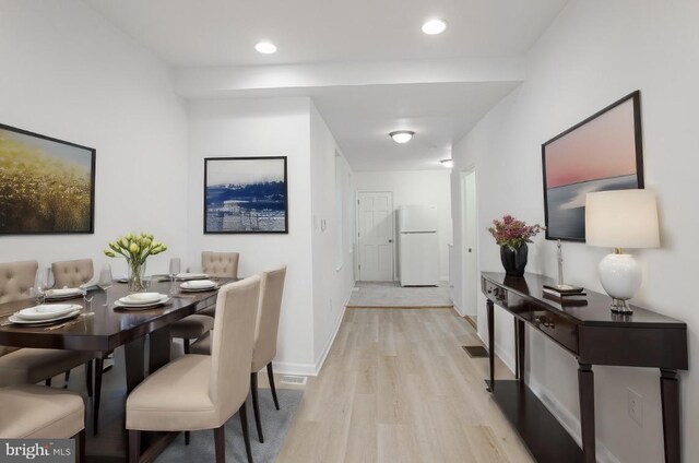 dining area featuring light hardwood / wood-style floors