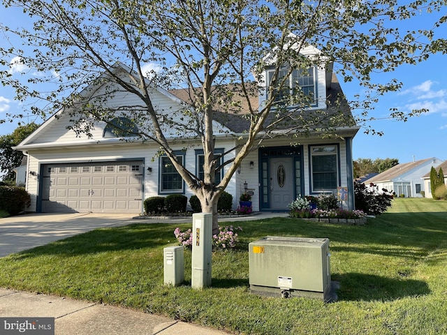 view of front facade featuring a front yard and a garage