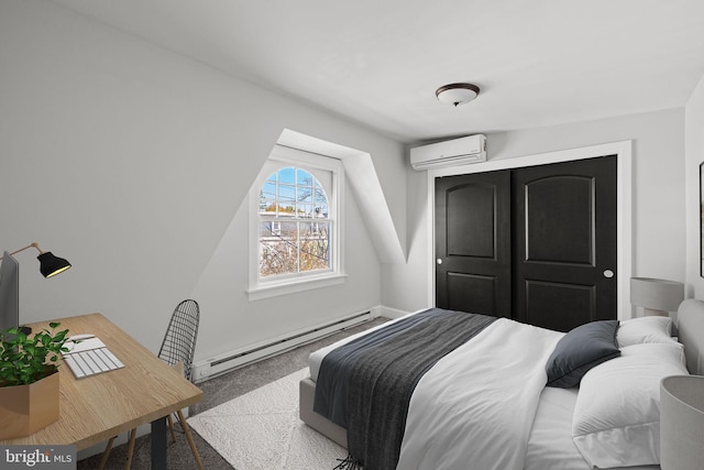 bedroom featuring a baseboard radiator, an AC wall unit, and carpet