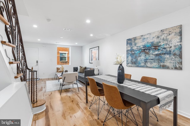 dining room with light wood-type flooring