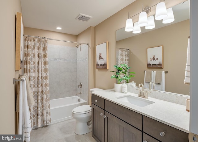 full bathroom featuring tile patterned flooring, vanity, toilet, and shower / bath combo