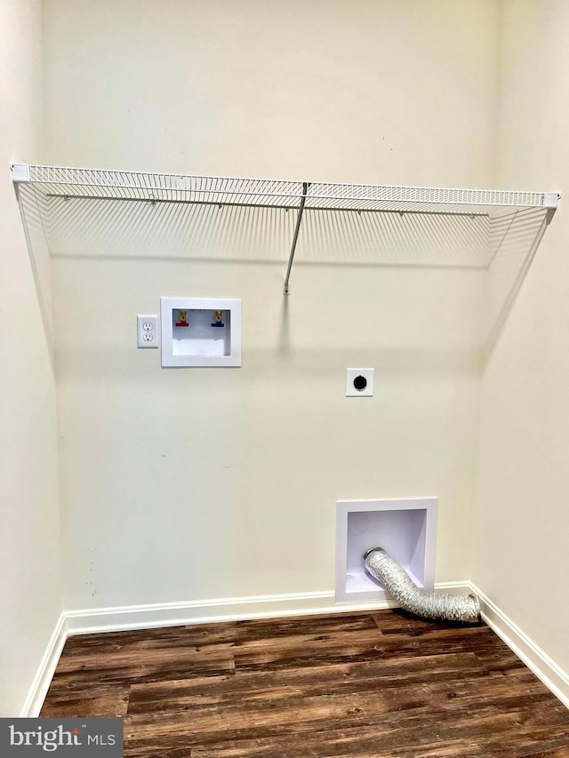 laundry area with hookup for an electric dryer, washer hookup, and hardwood / wood-style flooring