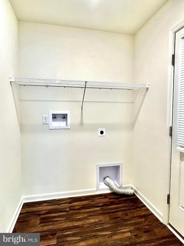 washroom featuring hookup for a washing machine, hardwood / wood-style floors, and hookup for an electric dryer