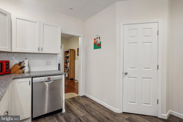 kitchen featuring white cabinets, backsplash, stone countertops, stainless steel dishwasher, and dark hardwood / wood-style floors