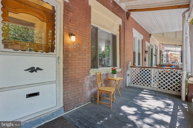 deck with covered porch