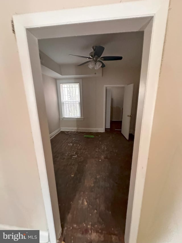 unfurnished room featuring ceiling fan