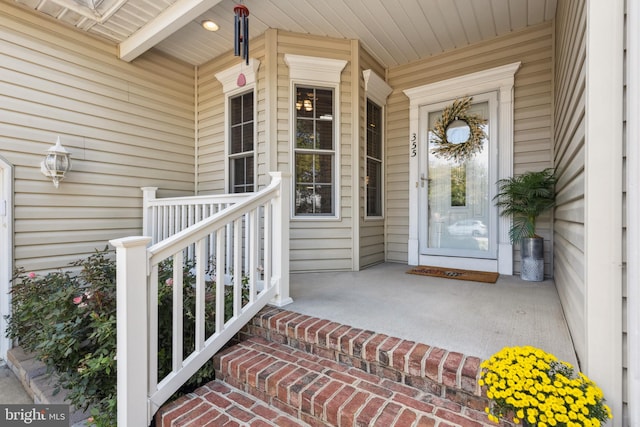 entrance to property with a porch