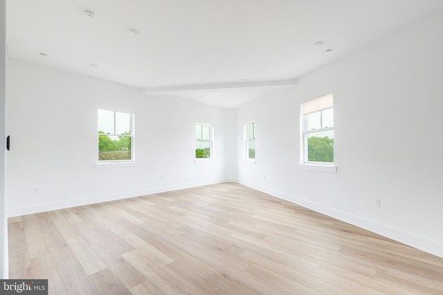 unfurnished room featuring light hardwood / wood-style flooring