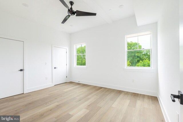 unfurnished bedroom featuring ceiling fan and light wood-type flooring