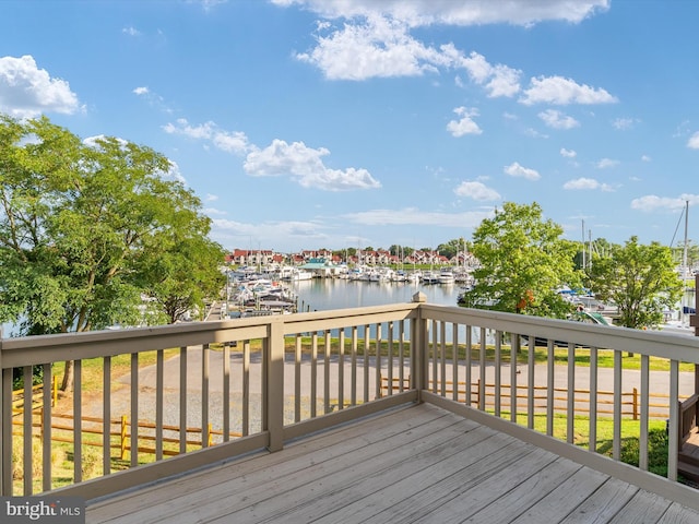 deck featuring a water view