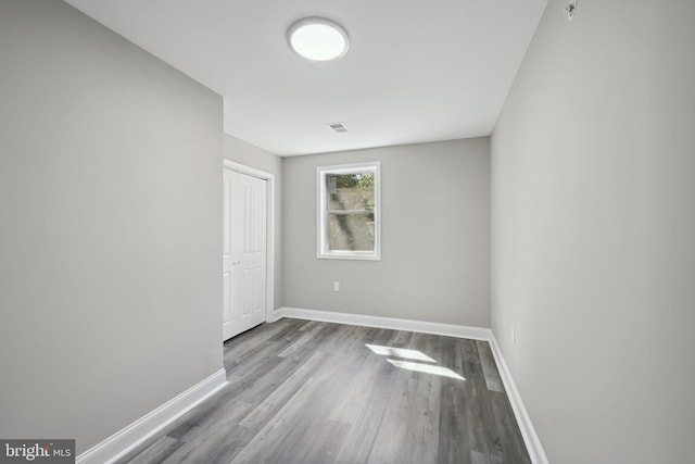 unfurnished room featuring light hardwood / wood-style floors