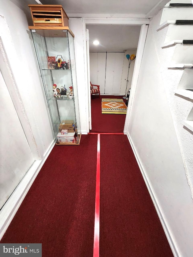 corridor with carpet floors