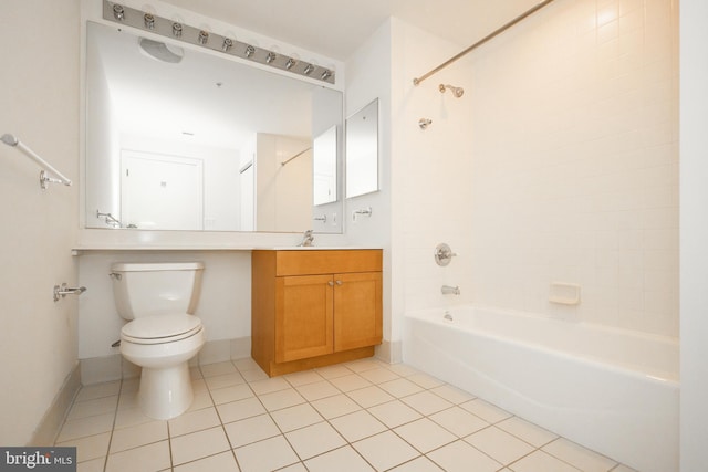 bathroom with tile patterned flooring, shower / bathing tub combination, toilet, and vanity