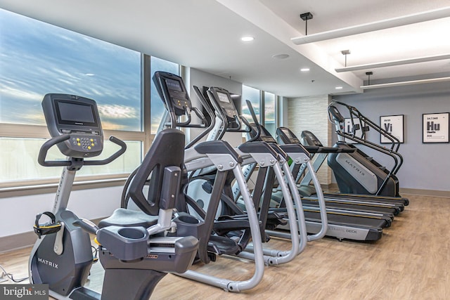 gym featuring light hardwood / wood-style flooring