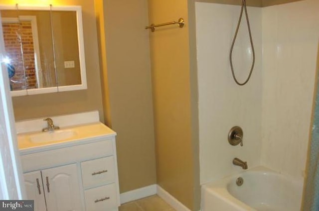 bathroom featuring shower / bathing tub combination and vanity