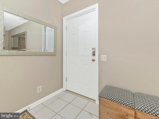 interior space featuring light tile patterned flooring