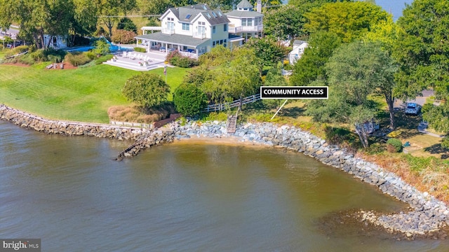 bird's eye view with a water view