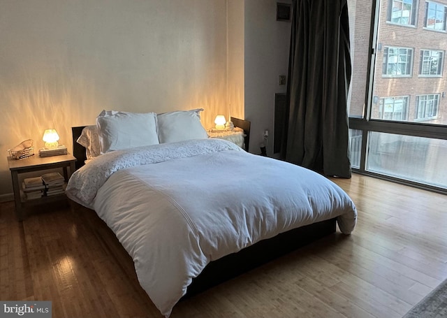 bedroom featuring hardwood / wood-style floors