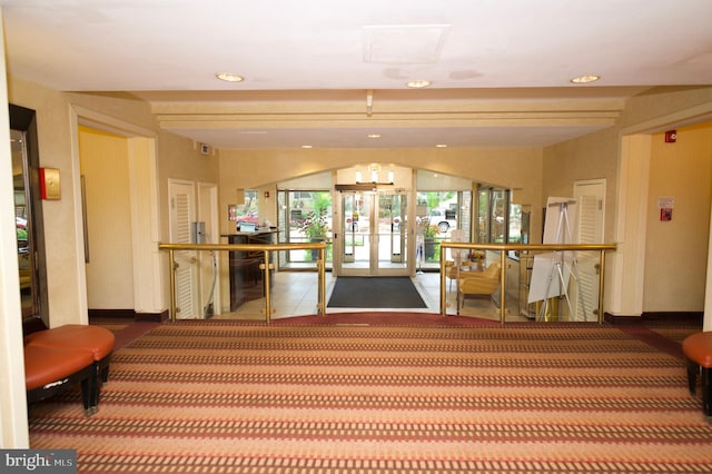 interior space featuring tile patterned flooring and french doors